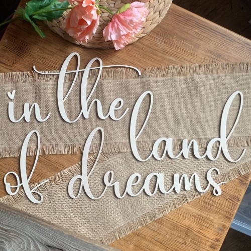 in the land of dreams drewniany napis